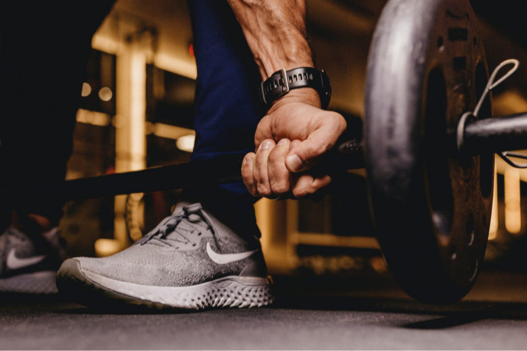 Ten Private Membership - 10 Best Health And Fitness Apps To Keep You Healthy A person lifting a barbell from the floor