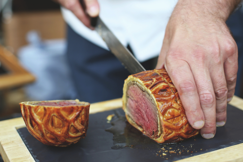 Slicing into a beef wellington