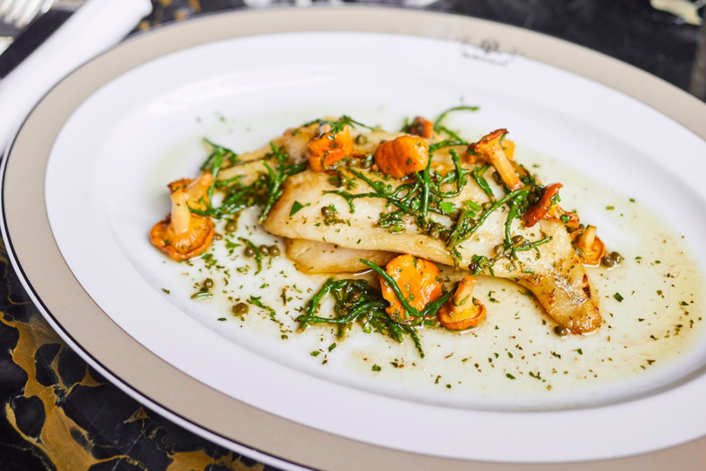 Plate of John Dory served at Corbin & King restaurant, The Wolseley