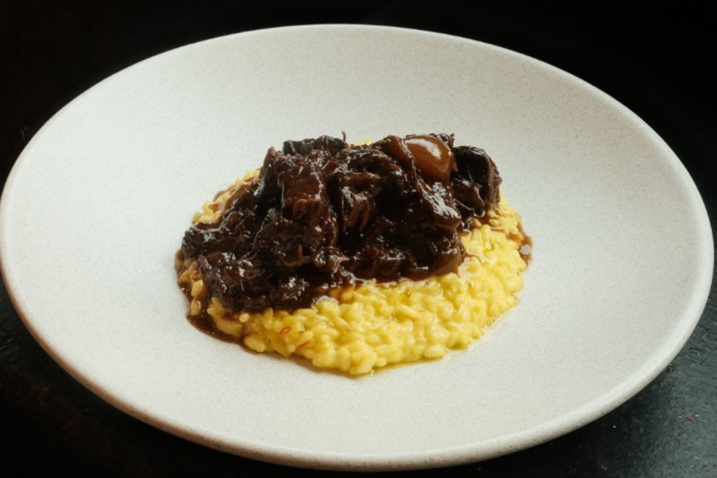 Portland exter beef shin slow braised in red wine, with saffron and parmesan risotto