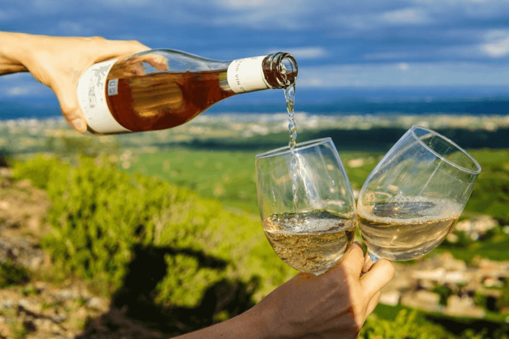 Pouring wine into glasses