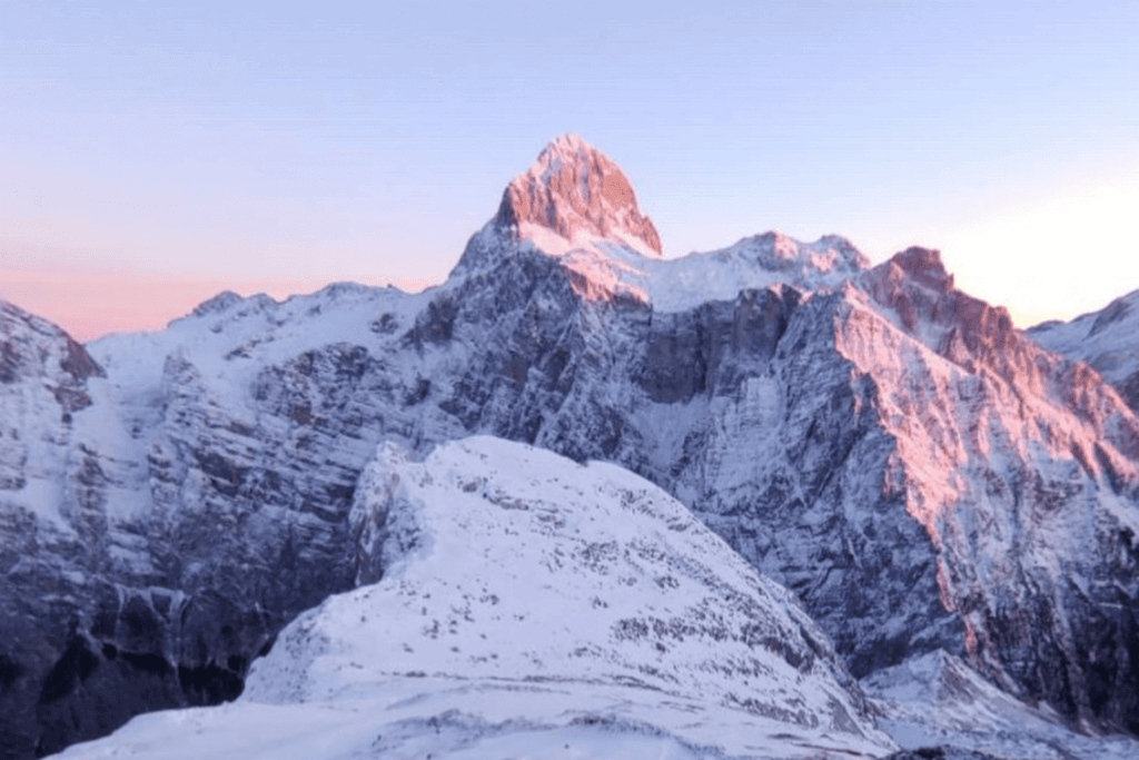 Snowy peak at sunrise